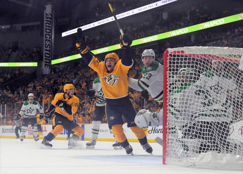 Nashville Predators center Rocco Grimaldi (23) celebrates after the game winning goal by Nashville Predators right wing Craig Smith (not pictured) past Dallas Stars goaltender Ben Bishop (30) in overtime of game two of the first round of the 2019 Stanley Cup Playoffs at Bridgestone Arena. (Christopher Hanewinckel-USA TODAY Sports)