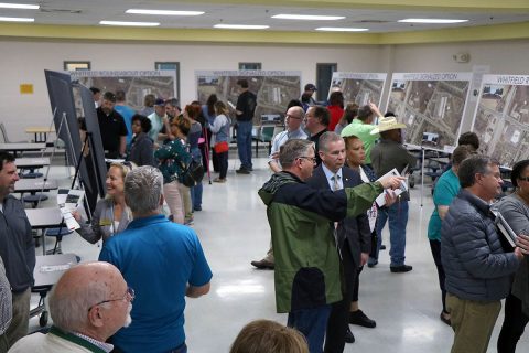 Clarksville Mayor Joe Pitts, City Council Members and city Street Department officials and consultants discuss the Whitfield Road project with citizens at an April 3rd public meeting.