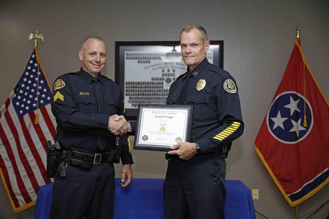 Clarksville Police Chief Al Ansley congratulates Joseph Scruggs on his promotion. (Jim Knoll, CPD)