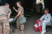 U.S. Army Soldiers assigned to the 501st Area Support Medical Company, based in Fort Campbell, Kentucky, conduct decontamination operations and medical evaluations during Guardian Response 2019 at Muscatatuck Urban Training Center in Indiana, May 1st, 2019. (Staff Sgt. Eric W. Jones, Army Reserve Medical Command)