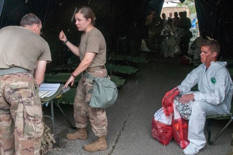 U.S. Army Soldiers assigned to the 501st Area Support Medical Company, based in Fort Campbell, Kentucky, conduct decontamination operations and medical evaluations during Guardian Response 2019 at Muscatatuck Urban Training Center in Indiana, May 1st, 2019. (Staff Sgt. Eric W. Jones, Army Reserve Medical Command) U.S. Army Soldiers assigned to the 501st Area Support Medical Company, based in Fort Campbell, Kentucky, conduct decontamination operations and medical evaluations during Guardian Response 2019 at Muscatatuck Urban Training Center in Indiana, May 1st, 2019. (Staff Sgt. Eric W. Jones, Army Reserve Medical Command)