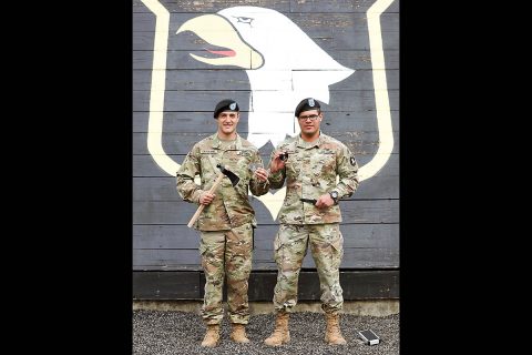 Pvt. Tony Cateriano (Left) from 1st Battalion, 26th Infantry Regiment and Pvt. Christan Morales (Right) from 1-502nd Infantry Regiment "First Strike", 2nd Brigade Combat Team, Fort Campbell KY, hold up their awards. Cateriano was the Honor Graduate for class 17-19 and Morales was the Ruck March Champion for class 17-19, April 4th, 2019. (Sgt. Justin Navin, 2nd Brigade Combat Team, 101st Airborne Division (AA) Public Affairs)