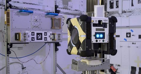 Astrobee flight units and docking unit in granite table lab at the Atomated Science Research Facility N-269 NASA Ames Research Center, Moffett Field in Silicon Valley California. (NASA)