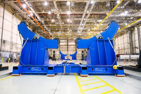 Technicians prepare the passive roller tool built by Futuramic in Warren, Michigan, to transport the massive liquid hydrogen fuel tank for NASA’s new deep space rocket, the Space Launch System (SLS), so that it can be joined to the top part of the core stage. The tool is enabling the construction of the rocket’s core stage that will be provide 2 million pounds of thrust to launch the Artemis-1 mission beyond the Moon. (NASA/Eric Bordelon)