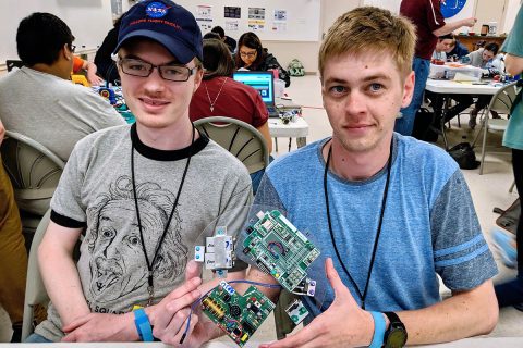 Austin Peay State University students Zach Hill, left, and Zach Givens show off some of their work during Rocket Week at NASA’s Wallops Flight Facility in Virginia. (APSU)