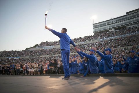 Shay Hampton, Department of Defense Warrior Games athlete raises the ceremonial torch at the opening ceremony of the Games in Colorado Springs, Colorado, June 2, 2018. This year's opening ceremony is June 22 in Tampa, Florida. Four Soldiers from the Fort Campbell Warrior Transition Battalion are among the 300 U.S and international competitors.  (U.S. Air Force, Senior Airman Dennis Hoffman)