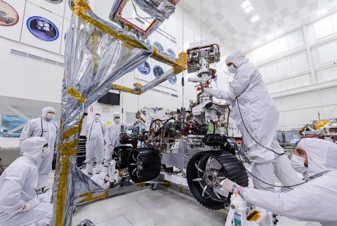 In this image, taken on June 13th, 2019, engineers at JPL install the starboard legs and wheels - otherwise known as the mobility suspension - on the Mars 2020 rover. (NASA/JPL-Caltech) In this image, taken on June 13th, 2019, engineers at JPL install the starboard legs and wheels - otherwise known as the mobility suspension - on the Mars 2020 rover. (NASA/JPL-Caltech)