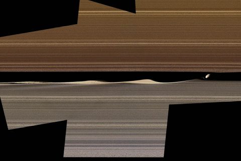 A false-color image mosaic shows Daphnis, one of Saturn's ring-embedded moons, and the waves it kicks up in the Keeler gap. Images collected by Cassini's close orbits in 2017 are offering new insight into the complex workings of the rings. (NASA/JPL-Caltech/Space Science Institute)