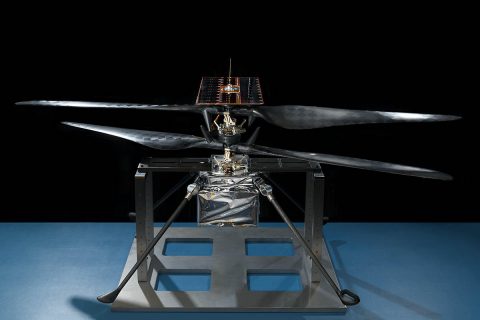 This image of the flight model of NASA's Mars Helicopter was taken on Feb. 14, 2019, in a cleanroom at NASA's Jet Propulsion Laboratory in Pasadena, California. The aluminum base plate, side posts, and crossbeam around the helicopter protect the helicopter's landing legs and the attachment points that will hold it to the belly of the Mars 2020 rover. (NASA/JPL-Caltech)