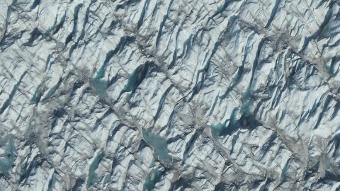 The Greenland Ice Sheet is the second-largest body of ice in the world, covering roughly 650,000 square miles of Greenland's surface. If it melts completely, it could contribute up to 23 feet of sea level rise, according to a new study using data from NASA's Operation IceBridge. (NASA / Jefferson Beck)