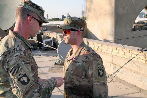 U.S. Army Col. Derek Thomson, deputy commander of Task Force Iraq and 1st Brigade Combat Team, 101st Airborne Division commander, presents U.S. Army Maj. Dana Lafarier, Task Force Iraq and 1st Brigade Combat Team, 101st Airborne Division fire support officer, with the Meritorious Service Medal for his contributions to the unit on June 30, 2019 in Baghdad. (Maj. Vonnie Wright, 1st Brigade Combat Team, 101st Airborne Division (AA) Public Affairs)