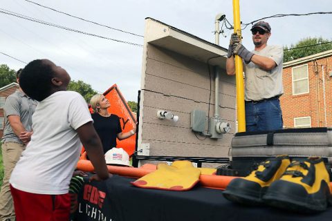 CDE Lightband employees volunteering during the Mayor’s Summer Night Lights event held twice a week throughout the summer.