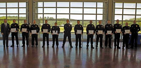 Newly promoted Clarksville Police Officers with Mayor Pitts, Chief Ansley and Deputy Chief Crockarell. (L to R) Mayor Pitts, Deputy Chief Stalder, Capt Koyama, Capt Lane, Lt Rosencrants, Lt Spielhagen, Chief Ansley, Lt Johnson, Sgt Coleman, Sgt Paugh, Sgt Doolittle, Sgt Shrum, Sgt Jobe, and Deputy Chief Crockarell. (Jim Knoll, CPD)