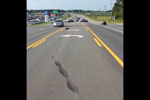 A Kia Sorrento pulled out in front of a Harley Motorcycle on Trenton Road causing the Harley to hit the Sorrento and then slide into the path of an oncoming Toyota. (Officer Szczerbiak, CPD)