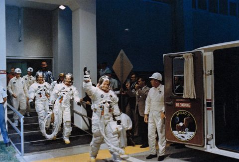 Apollo 11 astronauts (left to right) Aldrin, Collins, and Armstrong leaving crew quarters to enter the Astrovan for the ride to Launch Pad 39A.