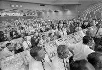 Engineers in KSC’s Firing Room watch the launch after Apollo 11 cleared the launch tower.