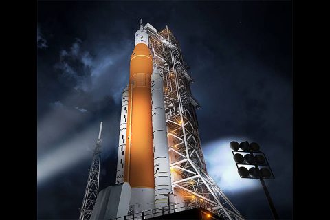 Artist's concept of the Space Launch System rocket and Orion capsule prepared for launch. (NASA)