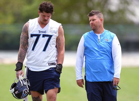 Tennessee Titans offensive tackle Taylor Lewan (77) talks with general manager Jon Robinson after minicamp at Saint Thomas Sports Park. (Christopher Hanewinckel-USA TODAY Sports)