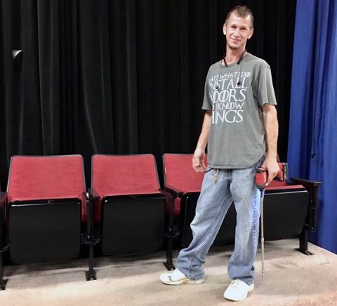 N&J Flooring’s Jeremy Tipton discovered the playbill and tickets when a row of old Trahern Theatre seats toppled on top of him. (APSU)