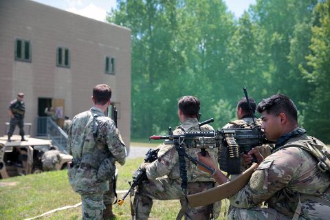 Soldiers of C Troop, 1st Squadron, 75th Cavalry Regiment, 2nd Brigade Combat Team, 101st Airborne Division, conduct a blank-fire raid on a building in the Fort Campbell training area on Wednesday, August 14, 2019. The soldiers spent two weeks training with Green Berets from 5th Special Forces Group (Airborne), on various battle drills, mission planning and casualty care. (U.S. Army photo by Staff Sgt. William Howard) 