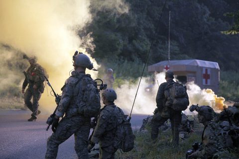 Green Berets from 5th Special Forces Group (Airborne), signal for an evacuation with soldiers of C Troop, 1st Squadron, 75th Cavalry Regiment, 2nd Brigade Combat Team, 101st Airborne Division, during the culminating event of a two-week exercise in the Fort Campbell training area on Friday, August 16, 2019. “Our goal was to do a week of SOP development, do small unit tactics and then take them through a planning process into operation,” said a Green Beret with 5th SFG(A). (U.S. Army photo by Staff Sgt. William Howard) 