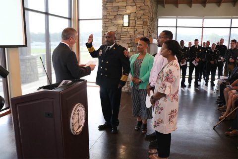 Clarksville Mayor Joe Pitts issues the oath of office to Freddie D. Montgomery Jr., Clarksville Fire Rescue’s 17th Fire Chief, during the swearing in ceremony Thursday at Freedom Point. (Samantha Stoffregen) Clarksville Mayor Joe Pitts issues the oath of office to Freddie D. Montgomery Jr., Clarksville Fire Rescue’s 17th Fire Chief, during the swearing in ceremony Thursday at Freedom Point. (Samantha Stoffregen)