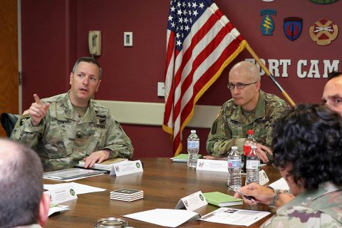 From left, Col. Patrick T. Birchfield, Blanchfield Army Community Hospital commander briefs Maj. Gen. Ron Place, Defense Health Agency acting director for health care administration Aug. 7. Place visited Blanchfield and Fort Campbell for further discussions on the hospital’s transition from Army Medicine to DHA, Oct. 1. (U.S. Army, Maria Yager)