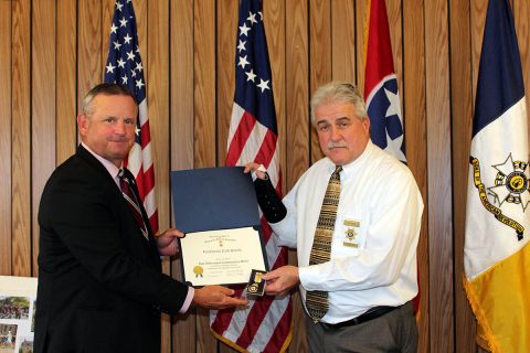 Montgomery County Mayor Jim Durrett congratulates Lieutenant Cliff Smith from the Montgomery County Sheriff’s Office.