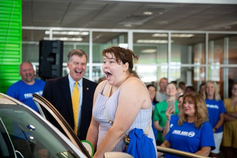 Senior Emily Mummaw from Northwest High School wins a car at the 11th Annual Pass and Go Event.