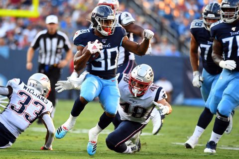 Tennessee Titans running back Jeremy McNichols (30) runs the ball during the first half against the New England Patriots at Nissan Stadium. (Christopher Hanewinckel-USA TODAY Sports)