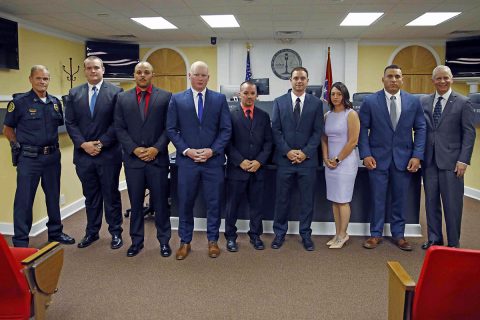 (L to R) Clarksville Police Chief Al Ansley, John Riley, Matthew Harrington, Tanner Cernick, Jorge Castillo, Matthew Cassford, Breighanna Dilsaver, Armando Ferreira, Clarksville Mayor Joe Pitts. (Jim Knoll, CPD)