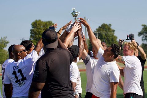 The flag football team from 2nd Battalion, 5th Special Forces Group (Airborne), celebrates their victory after the championship game during reunion week at Fort Campbell, Ky., Wednesday, Sept 18, 2019. They beat the team from 3rd Battalion, 5 SFG (A), by 29 points. (Sgt. Christopher Roberts)