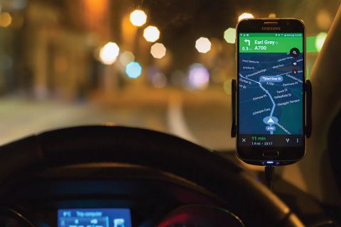 Google Maps Navigation software running as an app on a Samsung S6 smartphone, mounted above a car dashboard to provide driving directions. (NASA)