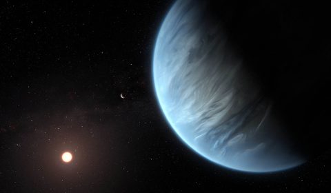 This artist’s impression shows the planet K2-18b, its host star and an accompanying planet in this system. K2-18b is now the only super-Earth exoplanet known to host both water and temperatures that could support life. (ESA/Hubble, M. Kornmesser)