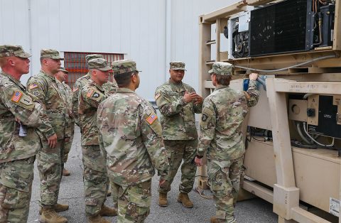 Chief Warrant Officer 4 Langston Washington (middle right), senior warrant officer, 101st Sustainment Brigade, 101st Airborne Division (Air Assault), describes to 101st Sust. Bde. senior leaders the various equipment Soldiers are using as the conduct vehicle maintenance. Col. Stephanie Barton (right), commander, 101st Sust. Bde, 101st Abn. Div. attended the tour to ensure the Soldiers has everything they need to be successful during the mission. (Sgt. Aimee Nordin, 101st Airborne Division (AA) Sustainment Brigade Public Affairs)