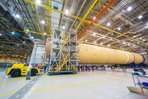 NASA finished assembling the main structural components for the Space Launch System (SLS) rocket core stage on Sept. 19. Engineers at NASA’s Michoud Assembly Facility in New Orleans fully integrated the last piece of the 212-foot-tall core stage by adding the engine section to the rest of the previously assembled structure. (NASA/Steven Seipel)