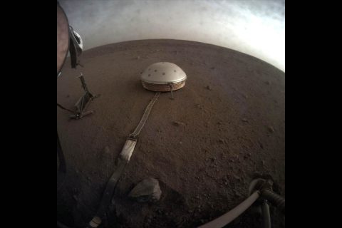 Clouds drift over the dome-covered seismometer, known as SEIS, belonging to NASA's InSight lander, on Mars. (NASA/JPL-Caltech)