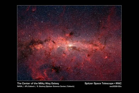 The center of our Milky Way galaxy is hidden from the prying eyes of optical telescopes by clouds of obscuring dust and gas. But in this stunning vista, the Spitzer Space Telescope's infrared cameras penetrate much of the dust, revealing the stars of the crowded galactic center region. The upcoming Webb telescope will offer a much-improved infrared view, teasing out fainter stars and sharper details. (NASA, JPL-Caltech, Susan Stolovy (SSC/Caltech) et al.)