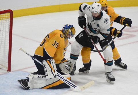 Nashville Predators goalie Pekka Rinne stops a shot on goal against the San Jose Sharks at Bridgestone Arena.(Michael Strasinger)