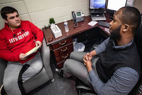 Austin Peay State University FSL Director Emmanuel Mejeun mentors a student. (APSU)