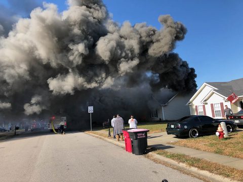 Clarksville Police Sergeant Johnny Ferguson acted quickly to save Two Men and a Dog from a house fire on Oakmont Drive.