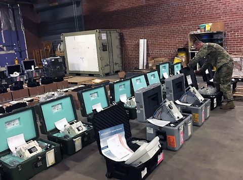 Maj. Craig Keech, chief of centralized contingency programs for the U.S. Army Medical Materiel Agency, organizes medical equipment on Oct. 18, 2019 at Sierra Army Depot, California, where units from the 531st Hospital Center from Fort Campbell, KY, participated in an Emergency Deployment Readiness Exercise. (Maj. Bryan Pamintuan) 