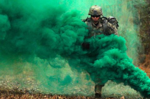 Sgt. Jordan Andry, cavalry scout from 1st Squadron, 33rd Cavalry, 3rd Brigade Combat Team, 101st Airborne Division (Air Assault), demonstrates a combat training lane for Expert Field Medic Badge candidates, Nov. 19, during EFMB training at Fort Campbell. One of the requirements to earn the EFMB is going through combat training lanes that include everything from patient evaluation to setting up a landing zone for a medical evacuation. (Spc. Jeremy Lewis, 40th Public Affairs Detachment) 