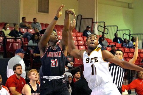 Austin Peay State University Men's Basketball junior #21 Terry Taylor drains a 3 pointer in 80-69 victory against over Alabama State. Taylor and Adams scored 30 points in the contest. (APSU Sports Information)