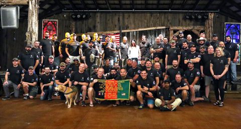 Veterans of B Company, 2nd Battalion, 504th Parachute Infantry Regiment, 82nd Airborne Division, Fort Bragg, North Carolina, pose for a group picture during a unit reunion, organized with the help of the Independence Fund, in Nashville, Tennessee, September 26-29. (Staff Sergeant Michael Eaddy, 3rd Brigade Combat Team, 101st Airborne Division (AA) Public Affairs) 