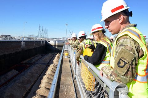 A group of Soldiers from Fort Campbell’s 326th Engineer Battalion, 101st Airborne Division watch a barge lock through at the Kentucky Lock Addition Project in Grand Rivers, KY. (Mark Rankin, U.S. Army Corps of Engineers, Nashville District)