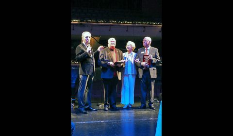 Gateway Chamber Orchestra Music Director Gregory Wolynec with Dee Boaz Crescendo Award Recipients Tom Perry, Dee Boaz, and Dave Farris at the annual Maestro’s Moonlight & Mistletoe Gala.