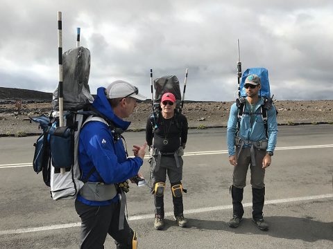 Members of the BASALT team wear backpacks designed for astronauts, during a Mars mission simulation in Hawaii Volcanoes National Park in November 2017. The packs carry technology tools for relaying information between the explorers in the field and scientists at the simulation’s Earth-based mission support center. Pictured, from left to right, are: Steve Chappell, BASALT exploration lead and a research specialist at NASA’s Johnson Space Center in Houston; Rick Elphic, a planetary scientist at NASA’s Ames Research Center in California’s Silicon Valley; and Mike Miller, telescience research and technology lead, from Kennedy Space Center, in Florida. (NASA)