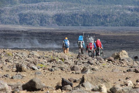 A team sets off across the volcanic terrain on Hawaii’s Kilauea volcano during the BASALT project’s November 2017 field campaign. They tested navigation and data transmission tools for future astronauts and collected geological and biological samples for the project’s science team, all under realistic communications delays and bandwidth limitations that missions will really experience on Mars. (NASA)