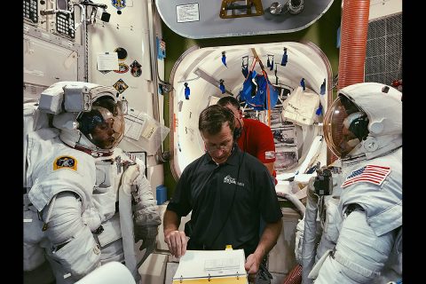 Boeing’s Chris Ferguson helps NASA astronauts Nicole Mann, left, and Mike Fincke, right, train for a spacewalk. (Boeing)